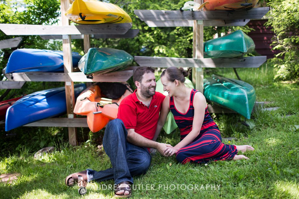 Posed in front of kayaks - Secret Engagement Proposal - Stockbridge, MA 