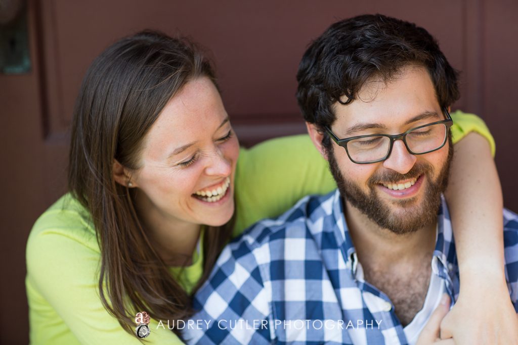 Fun couple laughing during engagement session
