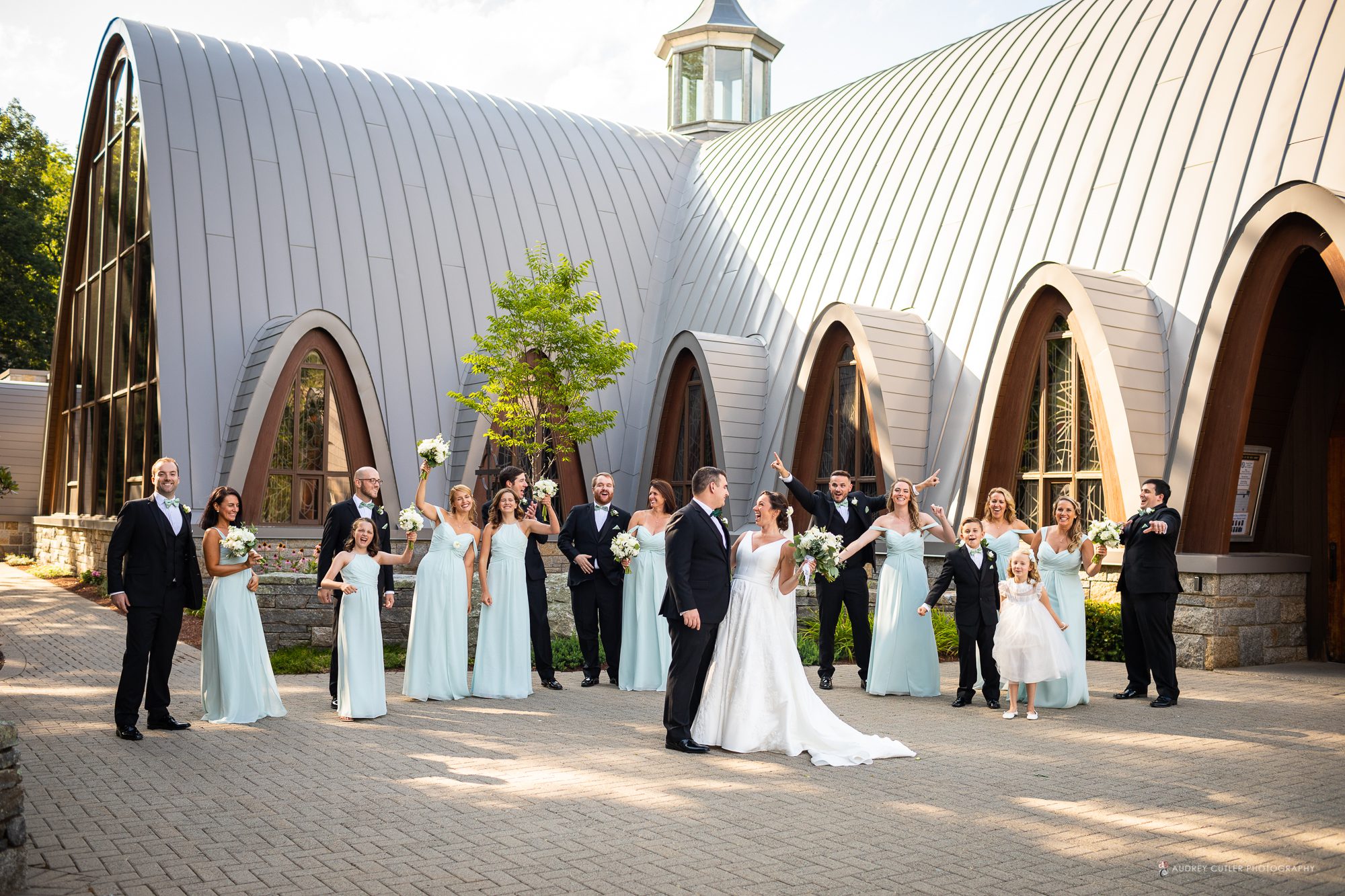 Wedding-party-in-front-of-chapel-of-the-holy-spirit-assumption-college-worcester-ma