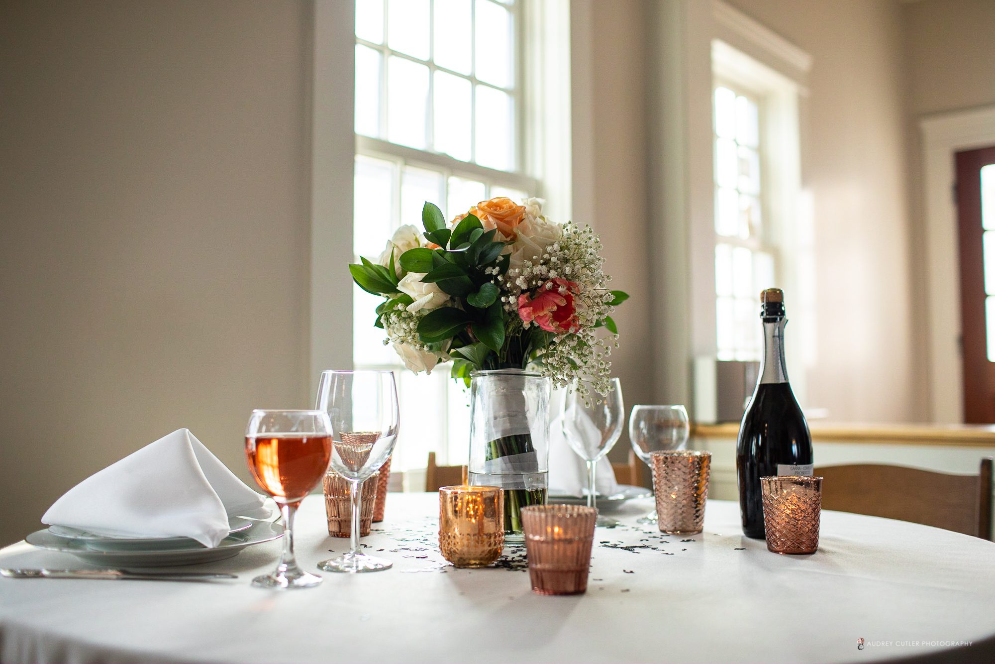 Wine-glasses-on-wedding-table-nashoba-valley-winery-bolton-ma