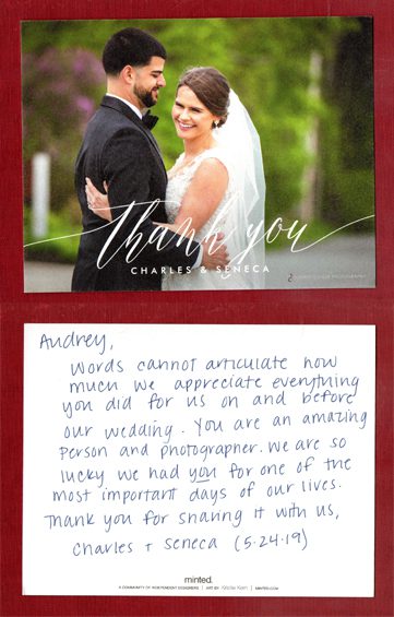 Hand-written-thank-you-note-to-wedding-photographer-with-photo-of-couple-smiling