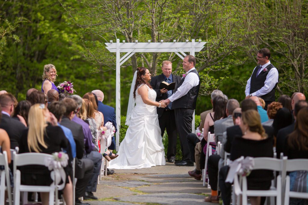 bride-and-groom-wedding-ceremony-stone-patio