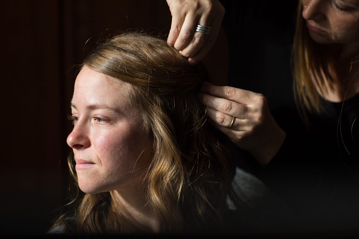 bride-getting-hair-and-make-up-on-wedding-day-Massachusetts-Photographer