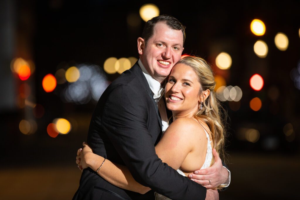 bride-and-groom-hug-at-night-worcester-massachusetts-wedding