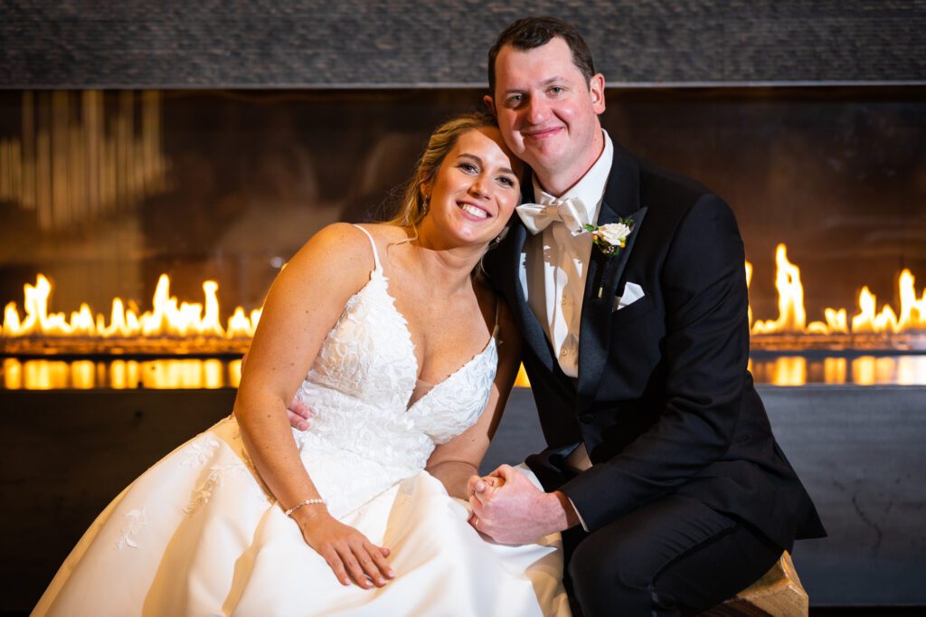 wedding-couple-infront-of-firepalce-ac-hotel-marriott-worcester-ma