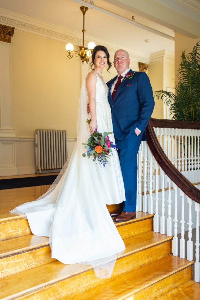 bride-groom-staircase-tuckerman-hall-worcester-ma-wedding-15