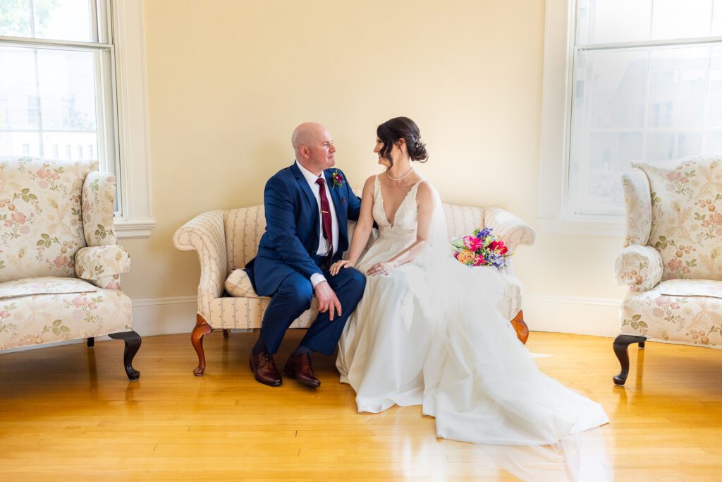 couple-on-couch-tuckerman-hall-worcester-ma-wedding-13