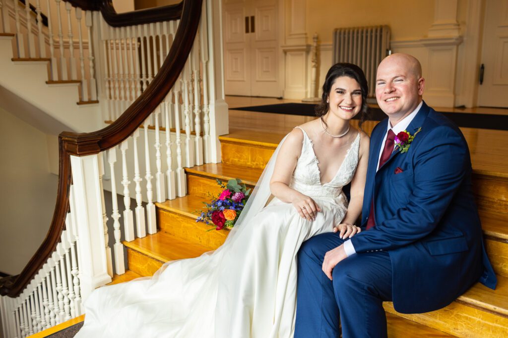couple-sitting-staircase-tuckerman-hall-worcester-ma-wedding-photos