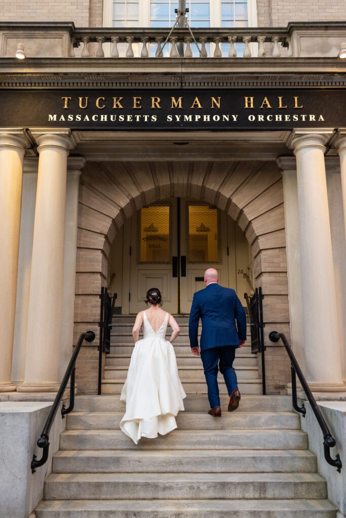 couple-walking-up steps-tuckerman-hall-worcester-ma-wedding-49