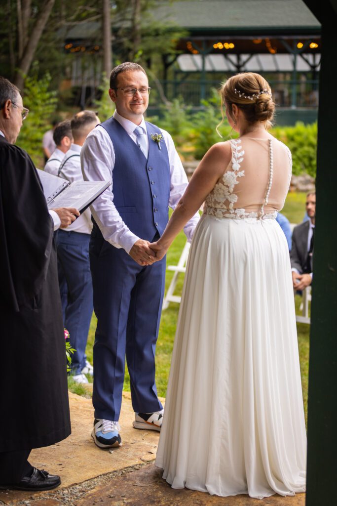 groom-smiling-at-bride-ceremony-massachusetts-1
