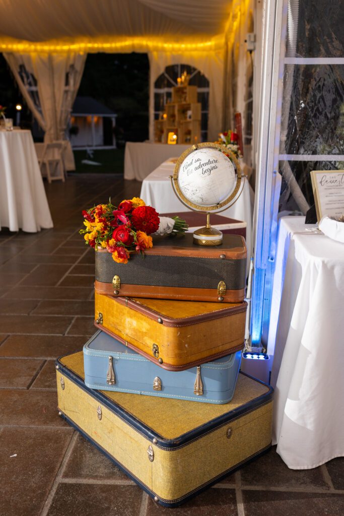 travel city themed wedding decor suitcases globes personal touch